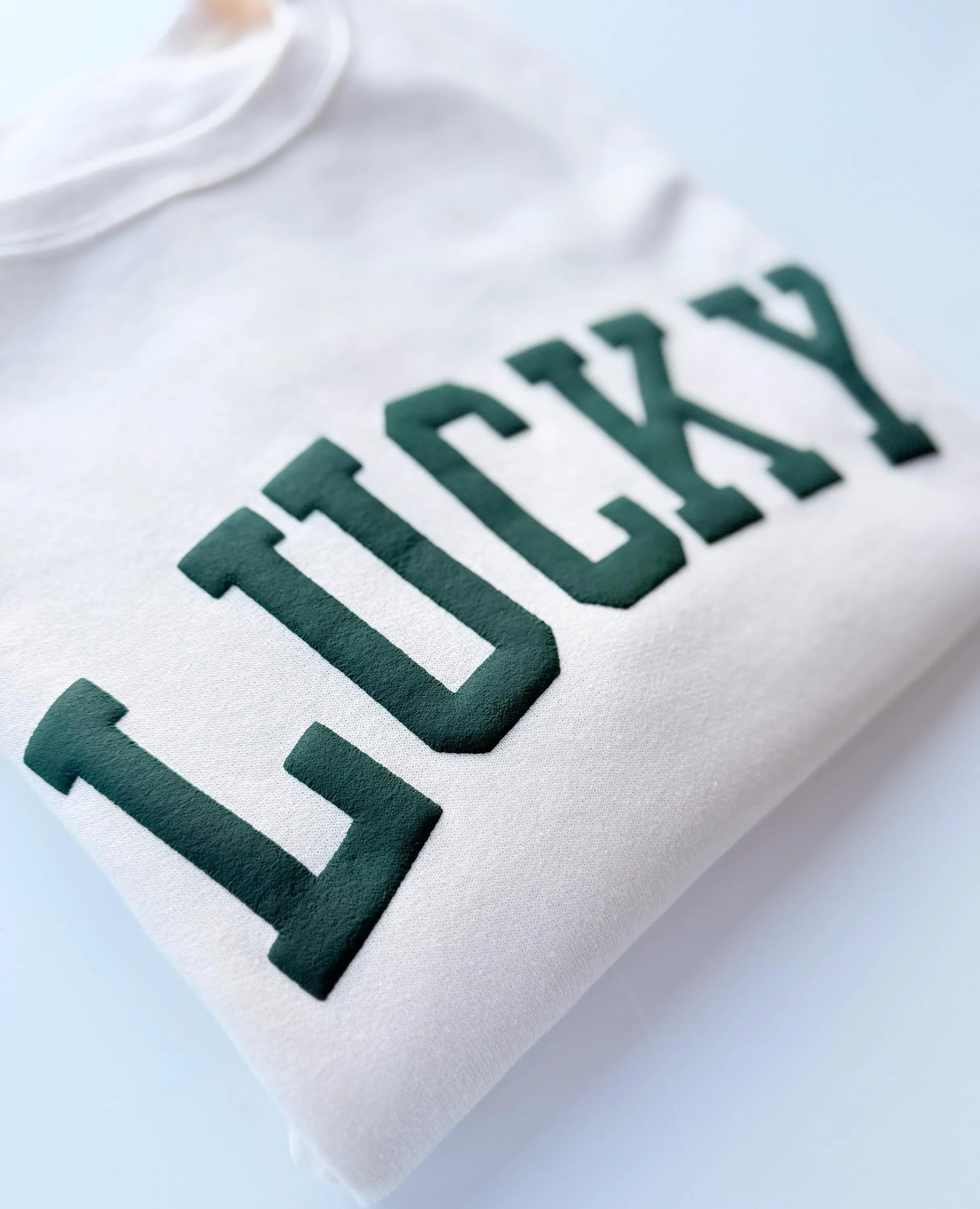 Embossed Lucky Varsity Sweatshirt