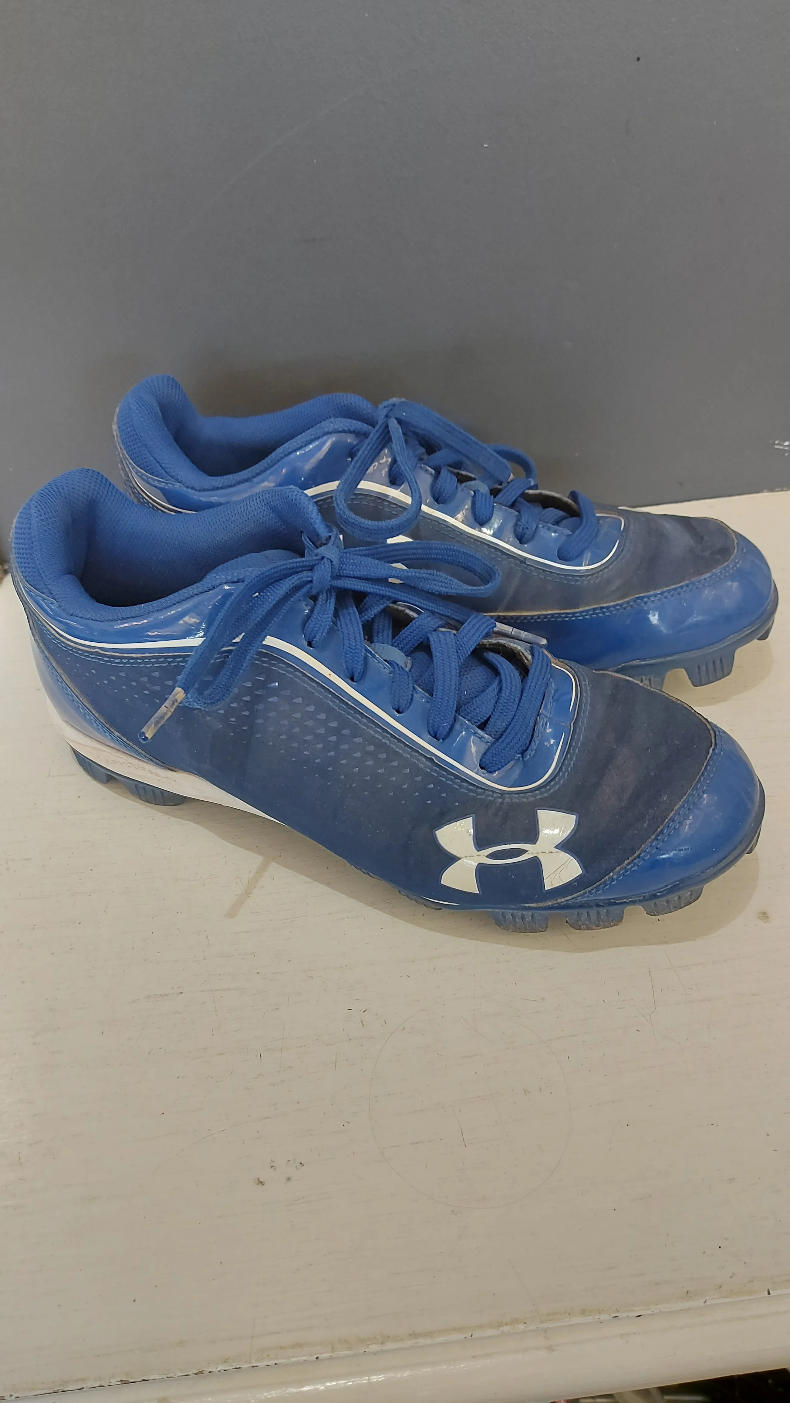 UA blue baseball cleats 8